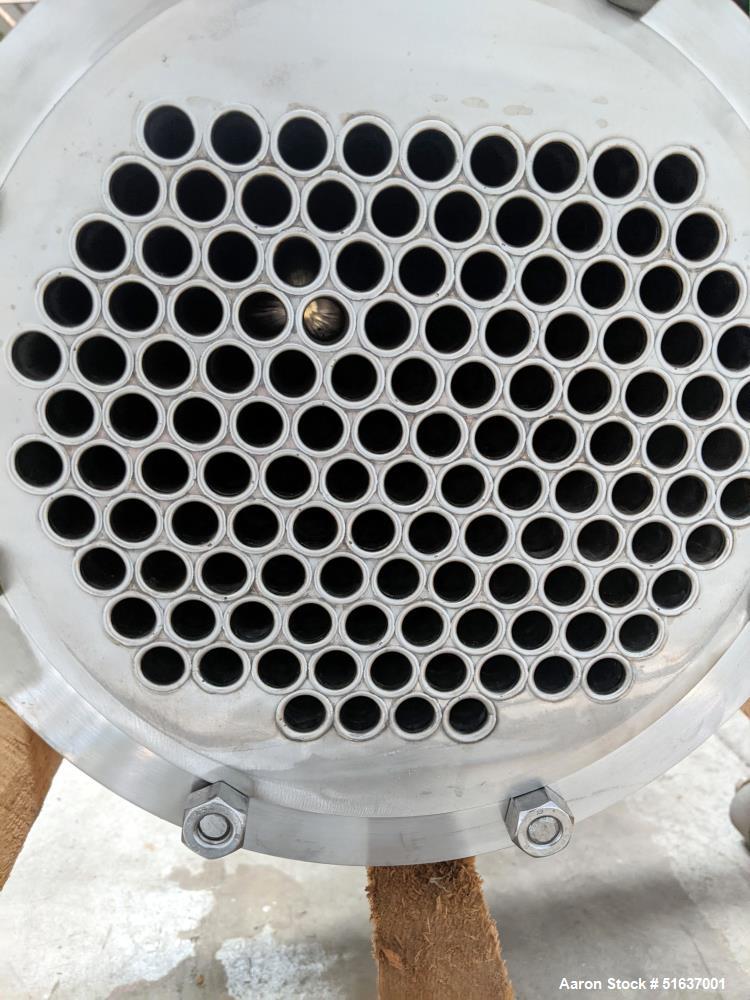 Unused- Enerquip Shell & Tube Heat Exchanger, Stainless Steel, Vertical. Approximate 132 square feet. 304L Stainless steel shell rated 150 psi at -20 to 375 degrees F. (126) 316L Stainless steel stra...