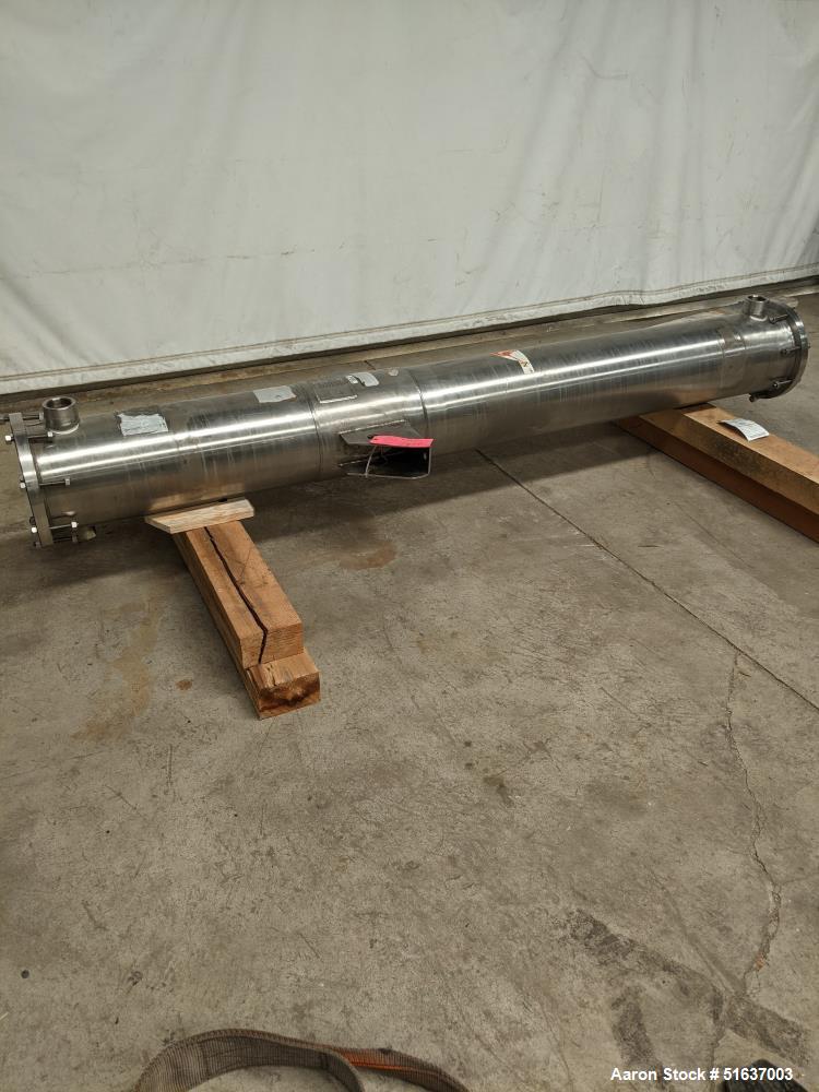 Used- Enerquip Shell & Tube Heat Exchanger, 304L Stainless Steel, Vertical. Approximate 136 square feet. 304L Stainless stee...