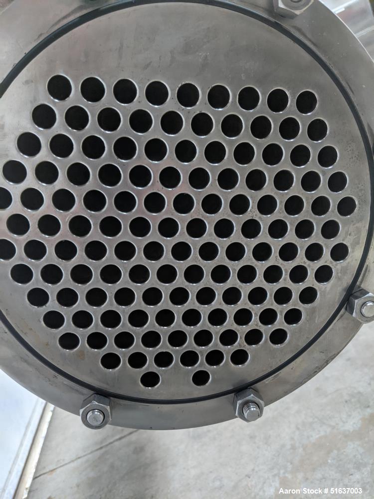 Used Enerquip Shell & Tube Heat Exchanger, 304L Stainless Steel, Vertical. Approximate 136 square feet. 304L Stainless steel shell rated 150 psi at -20 to 375 degrees F. (130) 304L Stainless steel st...