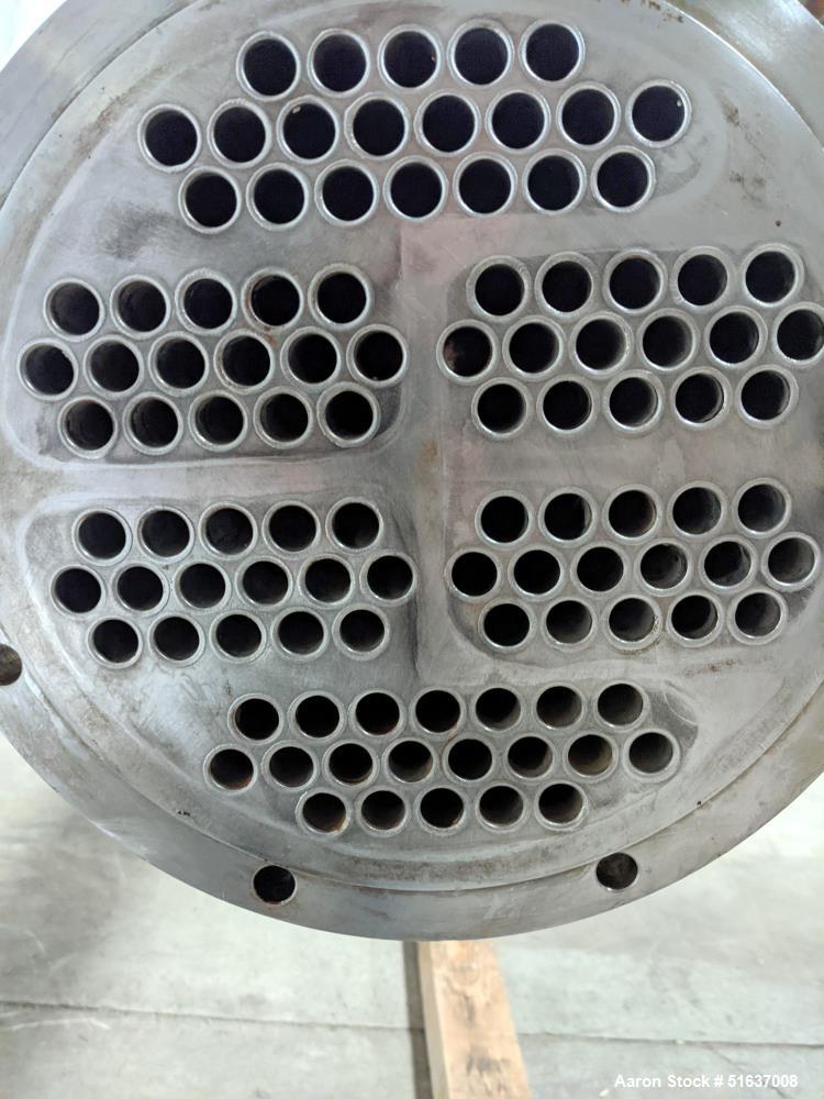 Used Enerquip Shell & Tube Heat Exchanger, Stainless Steel, Vertical. Approximate 109 square feet. 304L Stainless steel shell rated 150 psi at -20 to 375 degrees F. (104) 316L Stainless steel straigh...