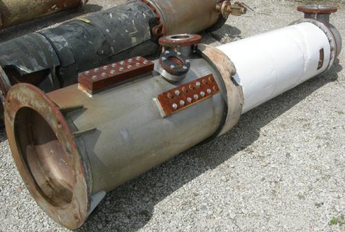 USED: Fab-Rite single pass shell and tube heat exchanger, approx 199 square feet, vertical. Carbon steel shell, stainless steel head with an 8" opening, (2) 2" nozzles for shell. Unit mounted on a 20...