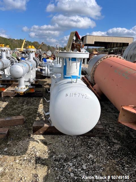 Used Fabsco 284 Square Foot Horizontal Shell and Tube Heat Exchanger. Duplex 2205 stainless steel tubes rated 150 psi at 32 to 150 degrees F, 14' Tube length, 3/4'' tube diameter. 21'' Shell diameter...