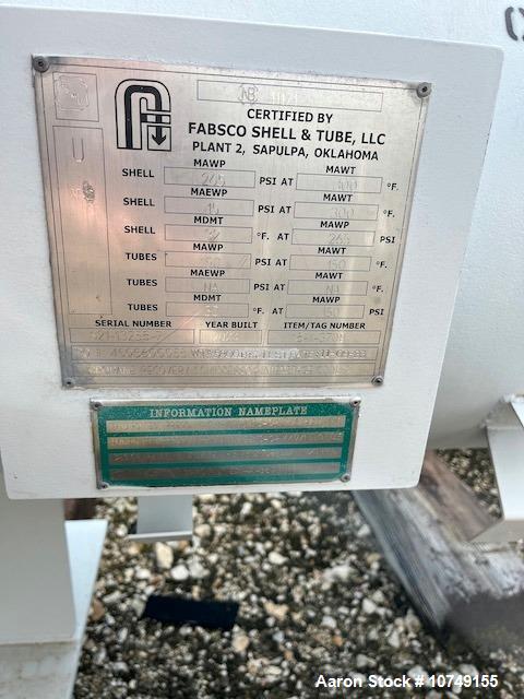 Used Fabsco 284 Square Foot Horizontal Shell and Tube Heat Exchanger. Duplex 2205 stainless steel tubes rated 150 psi at 32 to 150 degrees F, 14' Tube length, 3/4'' tube diameter. 21'' Shell diameter...