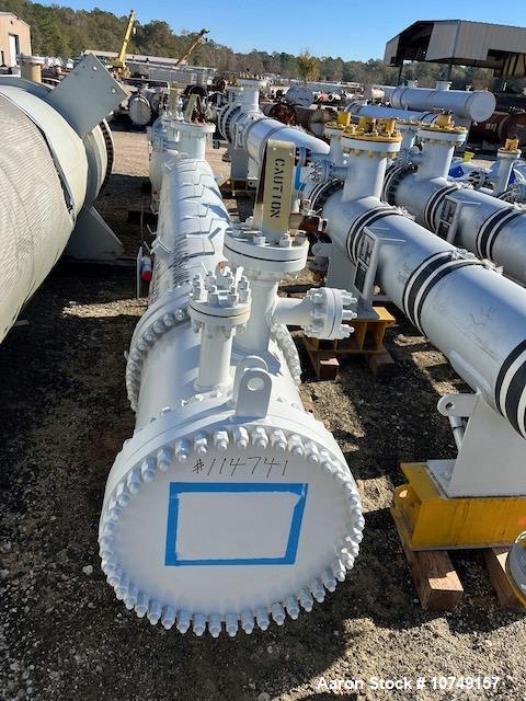 Used Fabsco Horizontal 284 sq. ft. Shell and Tube Heat Exchanger. Duplex 2205 stainless steel tubes rated 150 psi at 32 to 150 degrees F, 14' Tube length. Carbon steel head. Carbon Steel shell rated ...