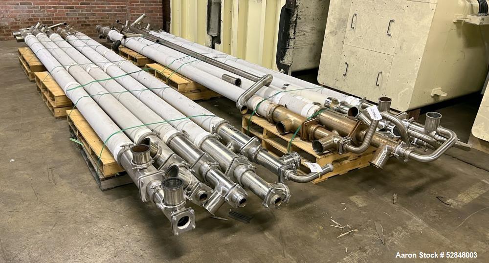 Used Feldmeier 6" x 4" x 2" Triple Tube Heater System with Hot Water Circulating Unit. Last used on citrus pulp for 20,000 lb/hr. (10) Approximate 6" diameter x 207" long tubes. 4" Product Inlet / Ou...