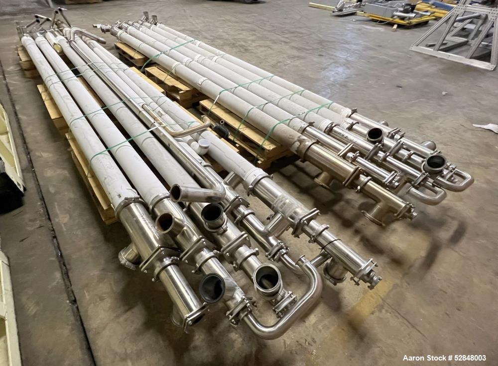 Used Feldmeier 6" x 4" x 2" Triple Tube Heater System with Hot Water Circulating Unit. Last used on citrus pulp for 20,000 lb/hr. (10) Approximate 6" diameter x 207" long tubes. 4" Product Inlet / Ou...