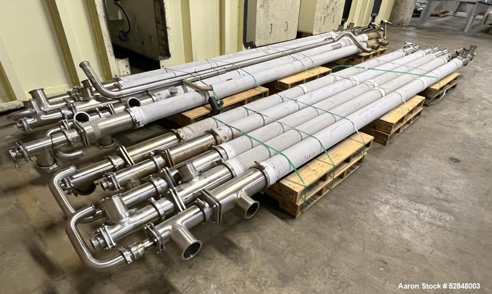 Used Feldmeier 6" x 4" x 2" Triple Tube Heater System with Hot Water Circulating Unit. Last used on citrus pulp for 20,000 lb/hr. (10) Approximate 6" diameter x 207" long tubes. 4" Product Inlet / Ou...