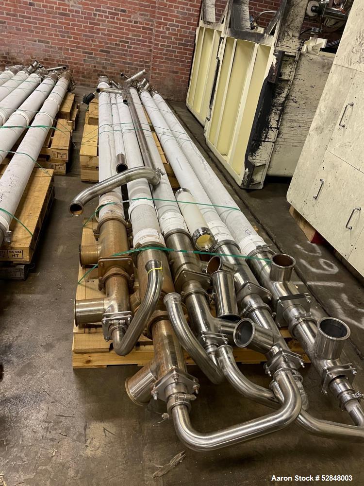 Used Feldmeier 6" x 4" x 2" Triple Tube Heater System with Hot Water Circulating Unit. Last used on citrus pulp for 20,000 lb/hr. (10) Approximate 6" diameter x 207" long tubes. 4" Product Inlet / Ou...