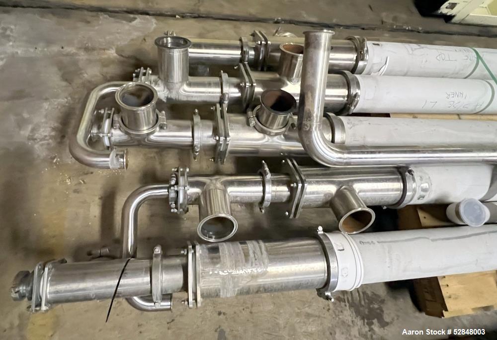 Used Feldmeier 6" x 4" x 2" Triple Tube Heater System with Hot Water Circulating Unit. Last used on citrus pulp for 20,000 lb/hr. (10) Approximate 6" diameter x 207" long tubes. 4" Product Inlet / Ou...