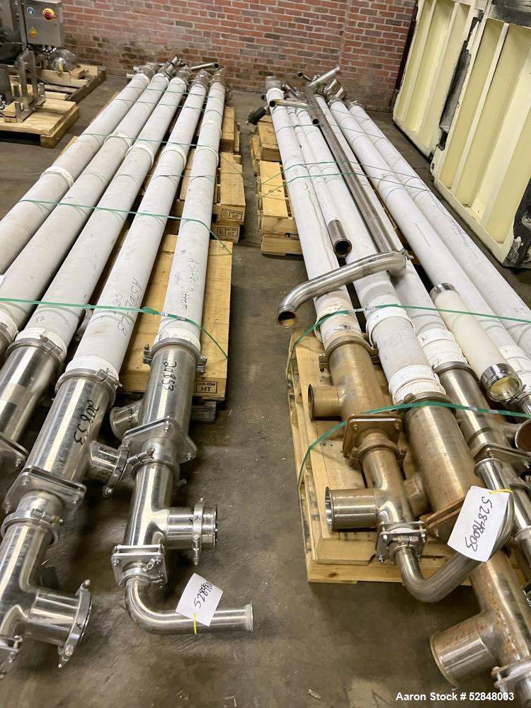 Used Feldmeier 6" x 4" x 2" Triple Tube Heater System with Hot Water Circulating Unit. Last used on citrus pulp for 20,000 lb/hr. (10) Approximate 6" diameter x 207" long tubes. 4" Product Inlet / Ou...