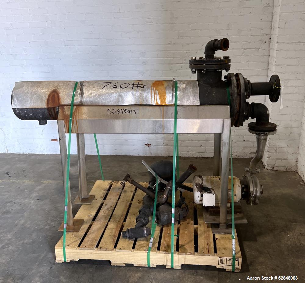 Used Feldmeier 6" x 4" x 2" Triple Tube Heater System with Hot Water Circulating Unit. Last used on citrus pulp for 20,000 lb/hr. (10) Approximate 6" diameter x 207" long tubes. 4" Product Inlet / Ou...