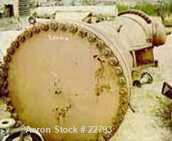 Unused-UNUSED: Foster Wheeler heat exchanger, 1871 square feet, vertical. Carbon steel shell and heads. 304 stainless steel tubes, tube sheet. 1695 tubes x 5/8" diameter x .028 BWG x 6' long, rated 7...