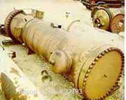 Unused-UNUSED: Foster Wheeler heat exchanger, 1871 square feet, vertical. Carbon steel shell and heads. 304 stainless steel tubes, tube sheet. 1695 tubes x 5/8" diameter x .028 BWG x 6' long, rated 7...