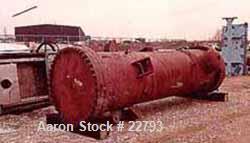 Unused-UNUSED: Foster Wheeler heat exchanger, 1871 square feet, vertical. Carbon steel shell and heads. 304 stainless steel tubes, tube sheet. 1695 tubes x 5/8" diameter x .028 BWG x 6' long, rated 7...