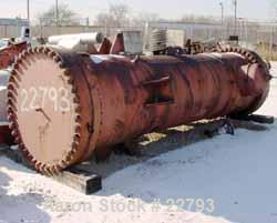 Unused-UNUSED: Foster Wheeler heat exchanger, 1871 square feet, vertical. Carbon steel shell and heads. 304 stainless steel tubes, tube sheet. 1695 tubes x 5/8" diameter x .028 BWG x 6' long, rated 7...