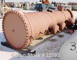 Unused-UNUSED: Foster Wheeler heat exchanger, 1871 square feet, vertical. Carbon steel shell and heads. 304 stainless steel tubes, tube sheet. 1695 tubes x 5/8" diameter x .028 BWG x 6' long, rated 7...