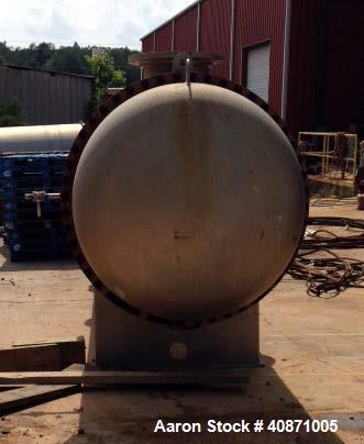 Used Gaston County Dyeing Machine Multiple Pass Shell and Tube Heat Exchanger. Approximate 4550 square feet, horizontal. 304L stainless steel shell rated 25psi/full vacuum at -20 to 250 degrees F. (1...