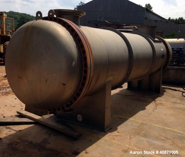 Used Gaston County Dyeing Machine Multiple Pass Shell and Tube Heat Exchanger. Approximate 4550 square feet, horizontal. 304L stainless steel shell rated 25psi/full vacuum at -20 to 250 degrees F. (1...