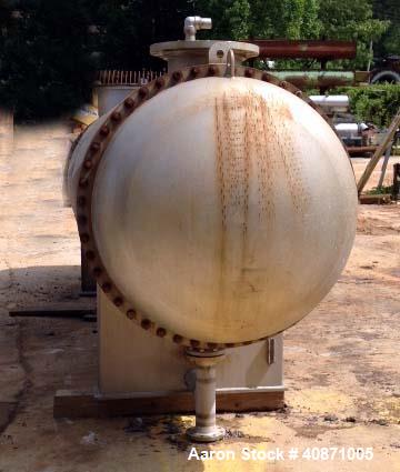 Used Gaston County Dyeing Machine Multiple Pass Shell and Tube Heat Exchanger. Approximate 4550 square feet, horizontal. 304L stainless steel shell rated 25psi/full vacuum at -20 to 250 degrees F. (1...