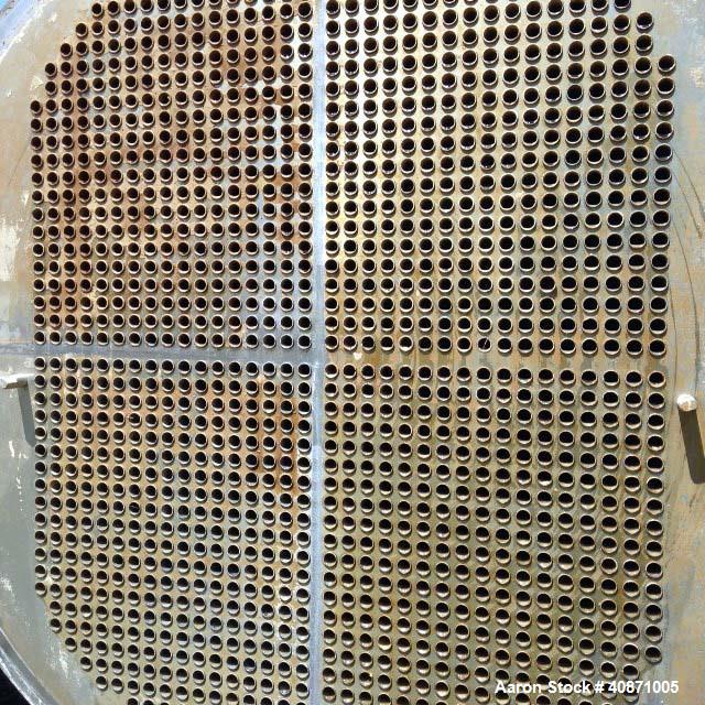 Used Gaston County Dyeing Machine Multiple Pass Shell and Tube Heat Exchanger. Approximate 4550 square feet, horizontal. 304L stainless steel shell rated 25psi/full vacuum at -20 to 250 degrees F. (1...