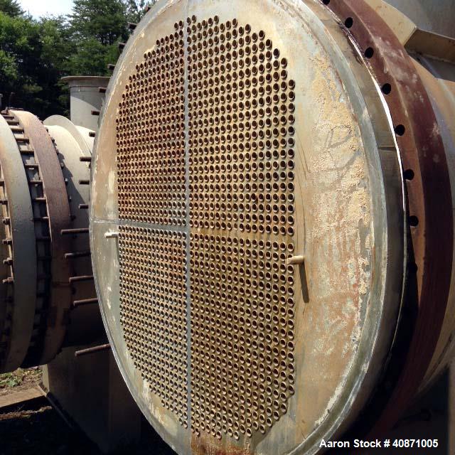 Used Gaston County Dyeing Machine Multiple Pass Shell and Tube Heat Exchanger. Approximate 4550 square feet, horizontal. 304L stainless steel shell rated 25psi/full vacuum at -20 to 250 degrees F. (1...