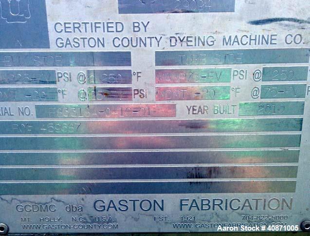 Used Gaston County Dyeing Machine Multiple Pass Shell and Tube Heat Exchanger. Approximate 4550 square feet, horizontal. 304L stainless steel shell rated 25psi/full vacuum at -20 to 250 degrees F. (1...