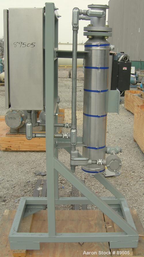 USED: Gaumer electrically heated circulation heater, 6 kW, inconel, vertical. Shell rated 150 psi at 250 deg F. (3) Elements, approximately 33" long. Flanged inlets/outlets, saddle mounted with stand...