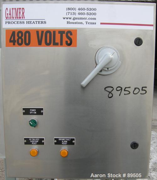 USED: Gaumer electrically heated circulation heater, 6 kW, inconel, vertical. Shell rated 150 psi at 250 deg F. (3) Elements, approximately 33" long. Flanged inlets/outlets, saddle mounted with stand...