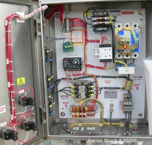 USED: Gaumer electrically heated circulation heater, 6 kW, inconel, vertical. Shell rated 150 psi at 250 deg F. (3) Elements, approximately 33" long. Flanged inlets/outlets, saddle mounted with stand...