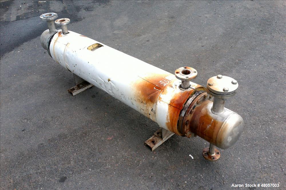 Used Gold-Bar Engineering Ltd. Shell & Tube Heat Exchanger, Stainless Steel, Horizontal. Approximate heating area 52 Square feet (4.9 m2). Tubes rated -1/6 kg/cm2 (-14/85 psi) at 100 degrees C (212 d...