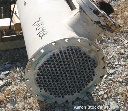 USED: Graham single pass shell and tube heat exchanger, 611 square feet, vertical. Carbon steel shell rated FV/20 psi at 150 deg F, (208) 3/4" diameter x 15' long 316 stainless steel tubes rated 75 p...