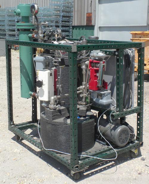 Used- Stainless Steel Graham Heliflow Heat Exchanger, model 30GC6C-16L, approximately 30 square feet