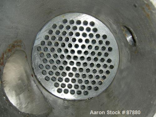 Used Graham single pass shell and tube heat exchanger, 107 square feet, horizontal. Carbon steel shell rated 75 psi at 300 deg.f., (117) 5/8" diameter x 5'  long 304 stainless steel tubes rated 75 ps...