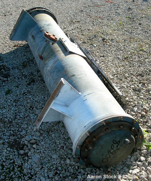 USED: Halberg six pass shell and tube heat exchanger, 157 square feet, horizontal. Carbon steel shell rated 6 bar (87 psi) at 100 deg C (212 deg F). (200) 1/2" diameter x 6' long 304 stainless steel ...