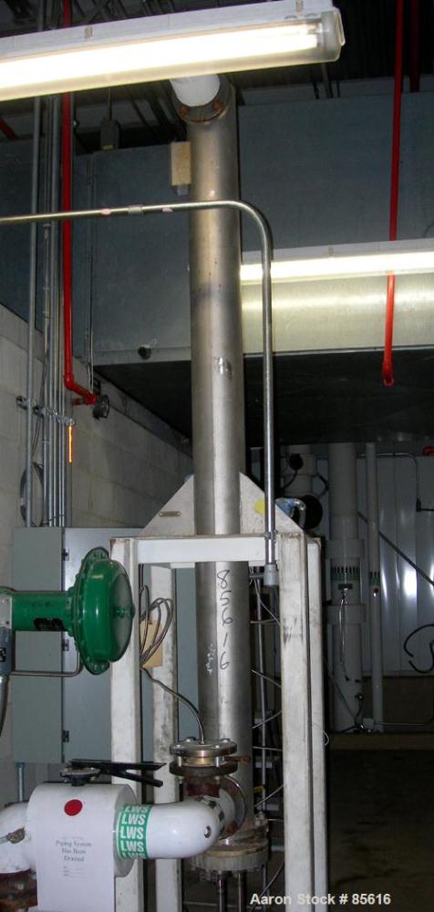USED: ITT U-tube heat exchanger, approximately 51 square feet, vertical. 316L stainless steel shell rated 150 psi at 350 degrees F, 316L stainless steel head. (34) 3/8" diameter x 7'6" long tubes rat...
