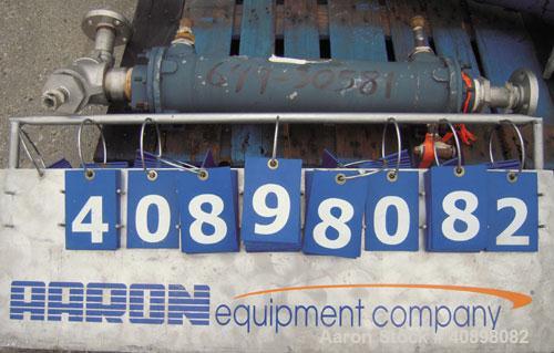 Used ITT Standard Single Pass Shell And Tube Heat Exchanger, 19 square feet, Part# 5-162-05-024-024, Horizontal. 316 stainless steel shell rated 225 psi at 450 deg.f., and –20 deg.f. at 225 psi. (80)...