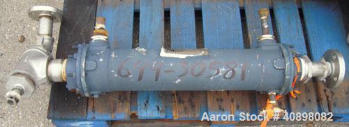 Used ITT Standard Single Pass Shell And Tube Heat Exchanger, 19 square feet, Part# 5-162-05-024-024, Horizontal. 316 stainless steel shell rated 225 psi at 450 deg.f., and –20 deg.f. at 225 psi. (80)...