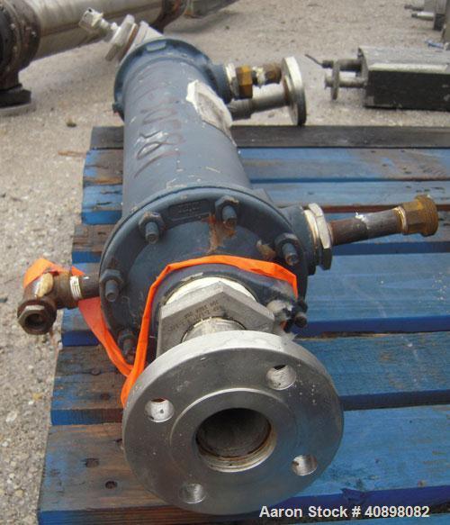 Used ITT Standard Single Pass Shell And Tube Heat Exchanger, 19 square feet, Part# 5-162-05-024-024, Horizontal. 316 stainless steel shell rated 225 psi at 450 deg.f., and –20 deg.f. at 225 psi. (80)...