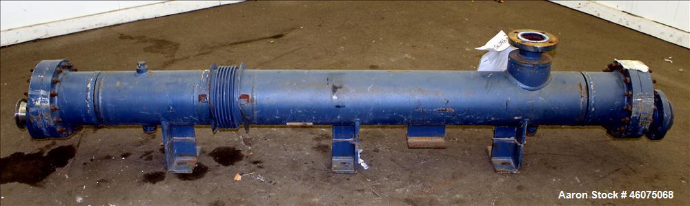 Used ITT Industries Shell & Tube Heat Exchanger, Approximate 124 Square Feet, Horizontal. Carbon steel shell rated 100 psi at -20 to 375 degrees F. (200) 3/8" Diameter x approximate 78" long 316 Stai...