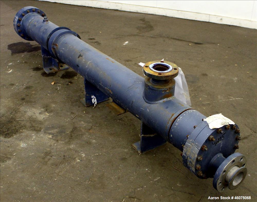 Used ITT Industries Shell & Tube Heat Exchanger, Approximate 124 Square Feet, Horizontal. Carbon steel shell rated 100 psi at -20 to 375 degrees F. (200) 3/8" Diameter x approximate 78" long 316 Stai...