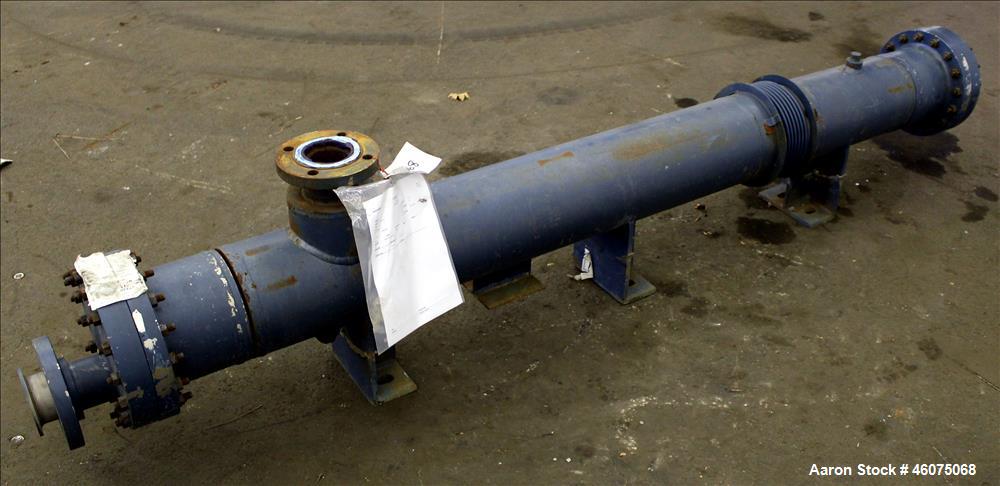 Used ITT Industries Shell & Tube Heat Exchanger, Approximate 124 Square Feet, Horizontal. Carbon steel shell rated 100 psi at -20 to 375 degrees F. (200) 3/8" Diameter x approximate 78" long 316 Stai...