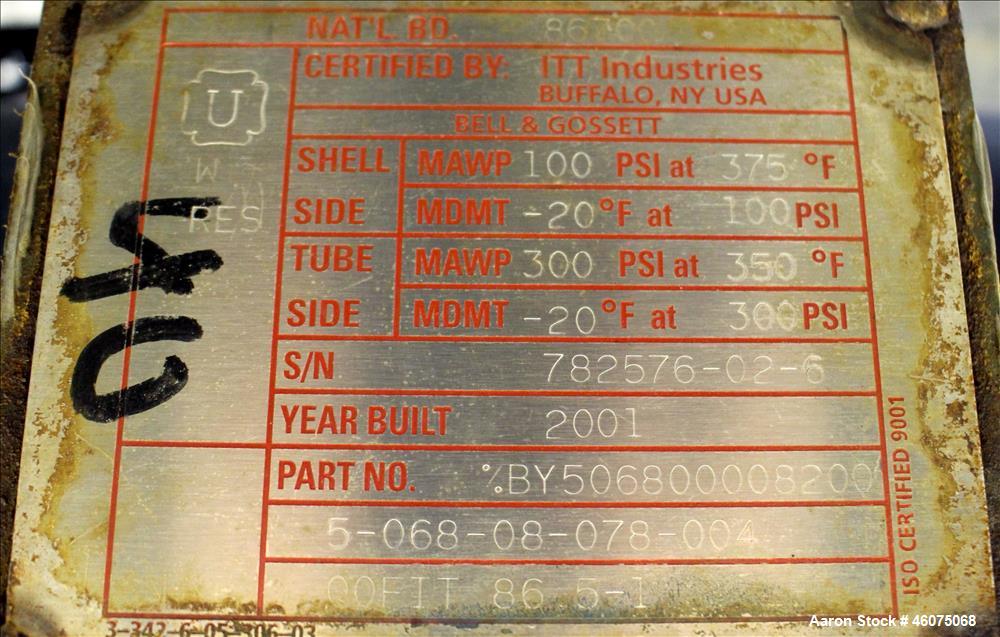 Used ITT Industries Shell & Tube Heat Exchanger, Approximate 124 Square Feet, Horizontal. Carbon steel shell rated 100 psi at -20 to 375 degrees F. (200) 3/8" Diameter x approximate 78" long 316 Stai...