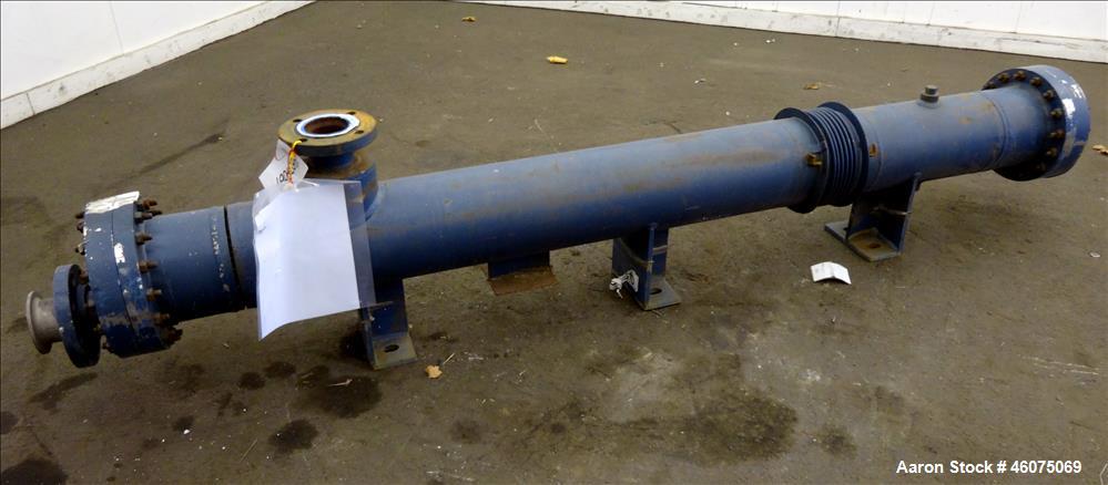 Used ITT Industries Shell & Tube Heat Exchanger, Approximate 124 Square Feet, Horizontal. Carbon steel shell rated 100 psi at -20 to 375 degrees F. (200) 3/8" Diameter x approximate 78" long 316 Stai...