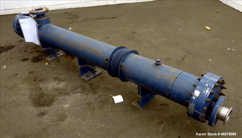 Used ITT Industries Shell & Tube Heat Exchanger, Approximate 124 Square Feet, Horizontal. Carbon steel shell rated 100 psi at -20 to 375 degrees F. (200) 3/8" Diameter x approximate 78" long 316 Stai...