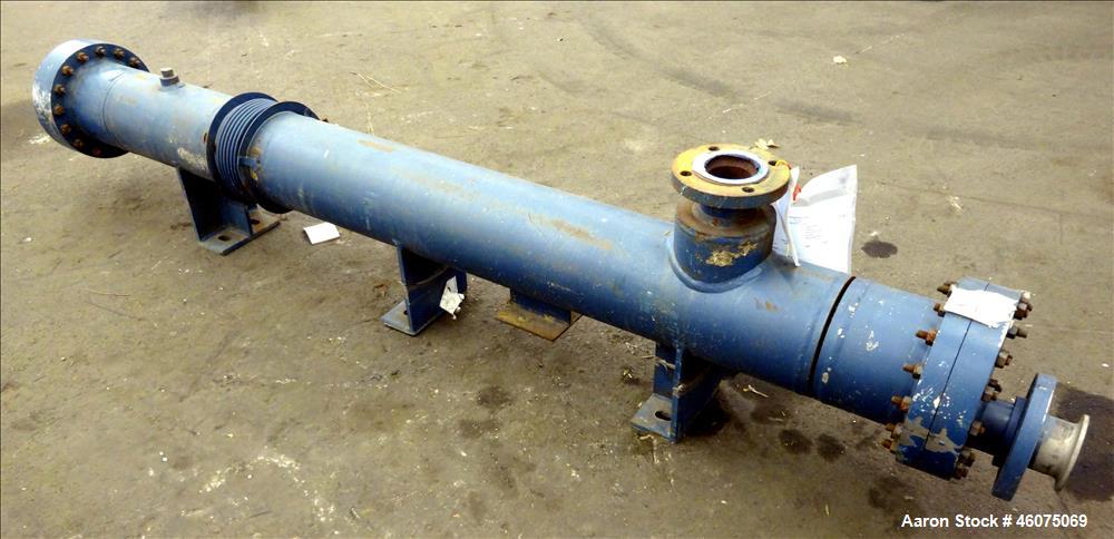 Used ITT Industries Shell & Tube Heat Exchanger, Approximate 124 Square Feet, Horizontal. Carbon steel shell rated 100 psi at -20 to 375 degrees F. (200) 3/8" Diameter x approximate 78" long 316 Stai...
