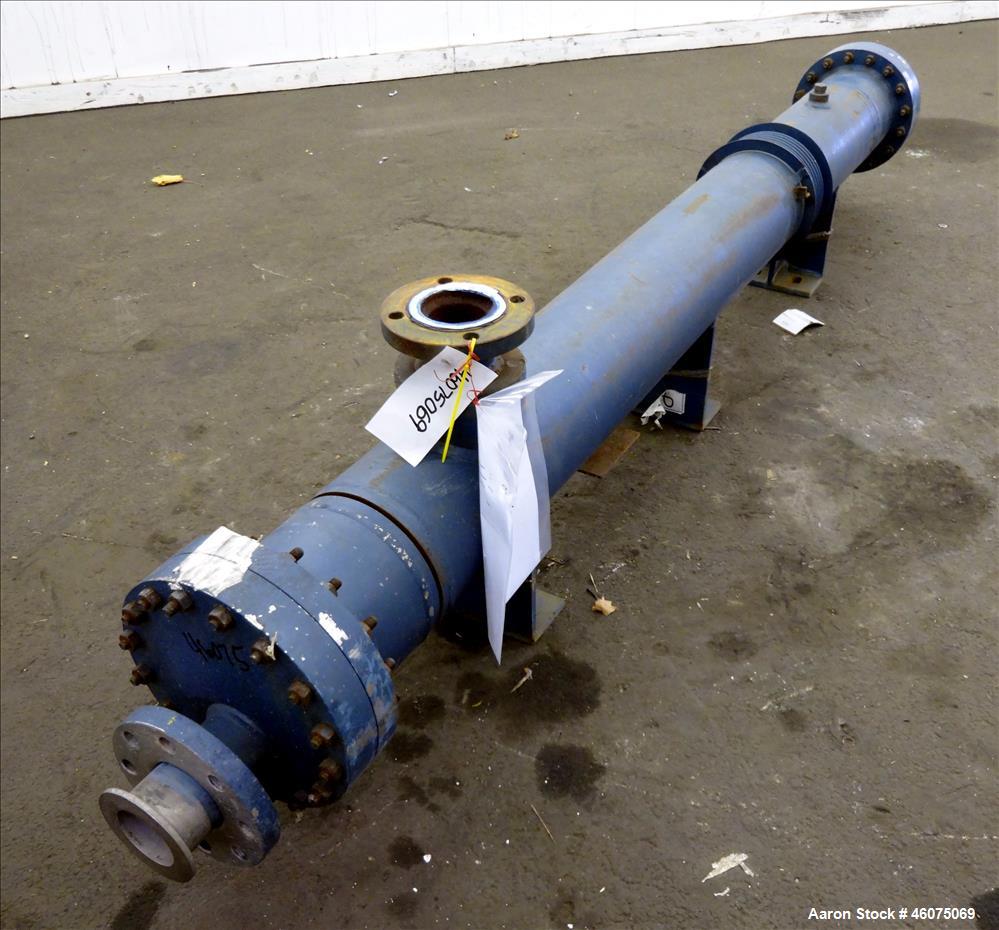 Used ITT Industries Shell & Tube Heat Exchanger, Approximate 124 Square Feet, Horizontal. Carbon steel shell rated 100 psi at -20 to 375 degrees F. (200) 3/8" Diameter x approximate 78" long 316 Stai...