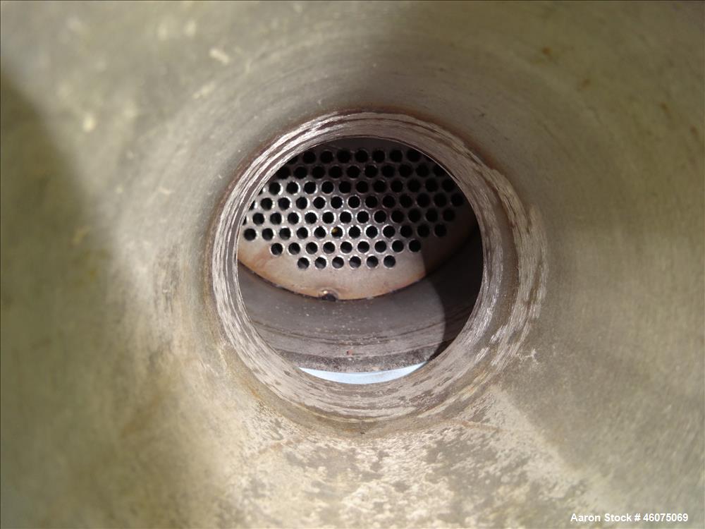 Used ITT Industries Shell & Tube Heat Exchanger, Approximate 124 Square Feet, Horizontal. Carbon steel shell rated 100 psi at -20 to 375 degrees F. (200) 3/8" Diameter x approximate 78" long 316 Stai...