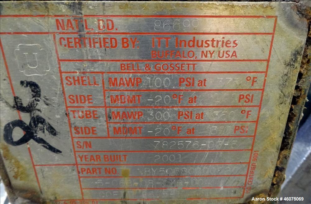 Used ITT Industries Shell & Tube Heat Exchanger, Approximate 124 Square Feet, Horizontal. Carbon steel shell rated 100 psi at -20 to 375 degrees F. (200) 3/8" Diameter x approximate 78" long 316 Stai...