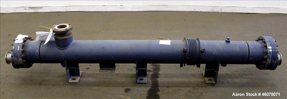 Used ITT Industries Shell & Tube Heat Exchanger, Approximate 124 Square Feet, Horizontal. Carbon steel shell rated 100 psi at -20 to 375 degrees F. (200) 3/8" Diameter x approximate 78" long 316 Stai...