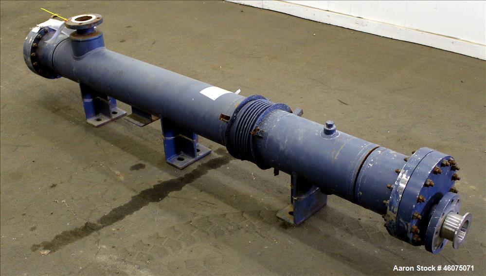 Used ITT Industries Shell & Tube Heat Exchanger, Approximate 124 Square Feet, Horizontal. Carbon steel shell rated 100 psi at -20 to 375 degrees F. (200) 3/8" Diameter x approximate 78" long 316 Stai...